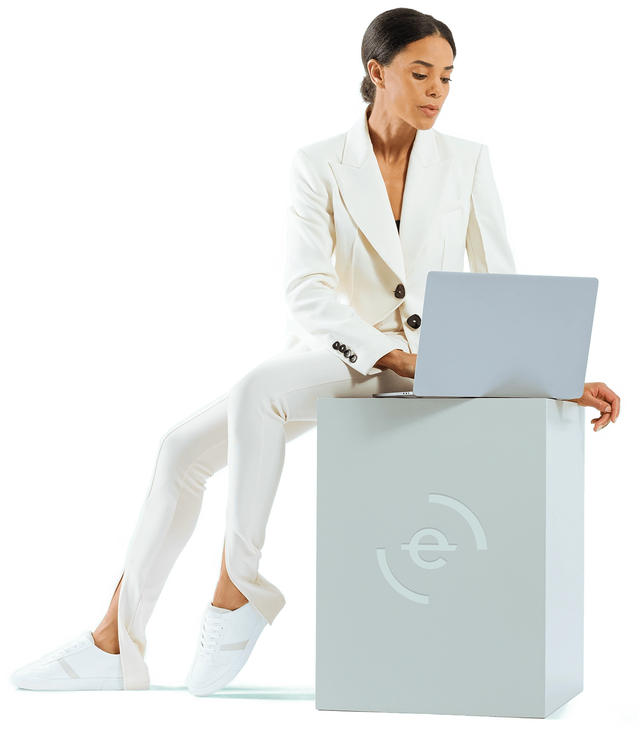Woman sitting next to a computer